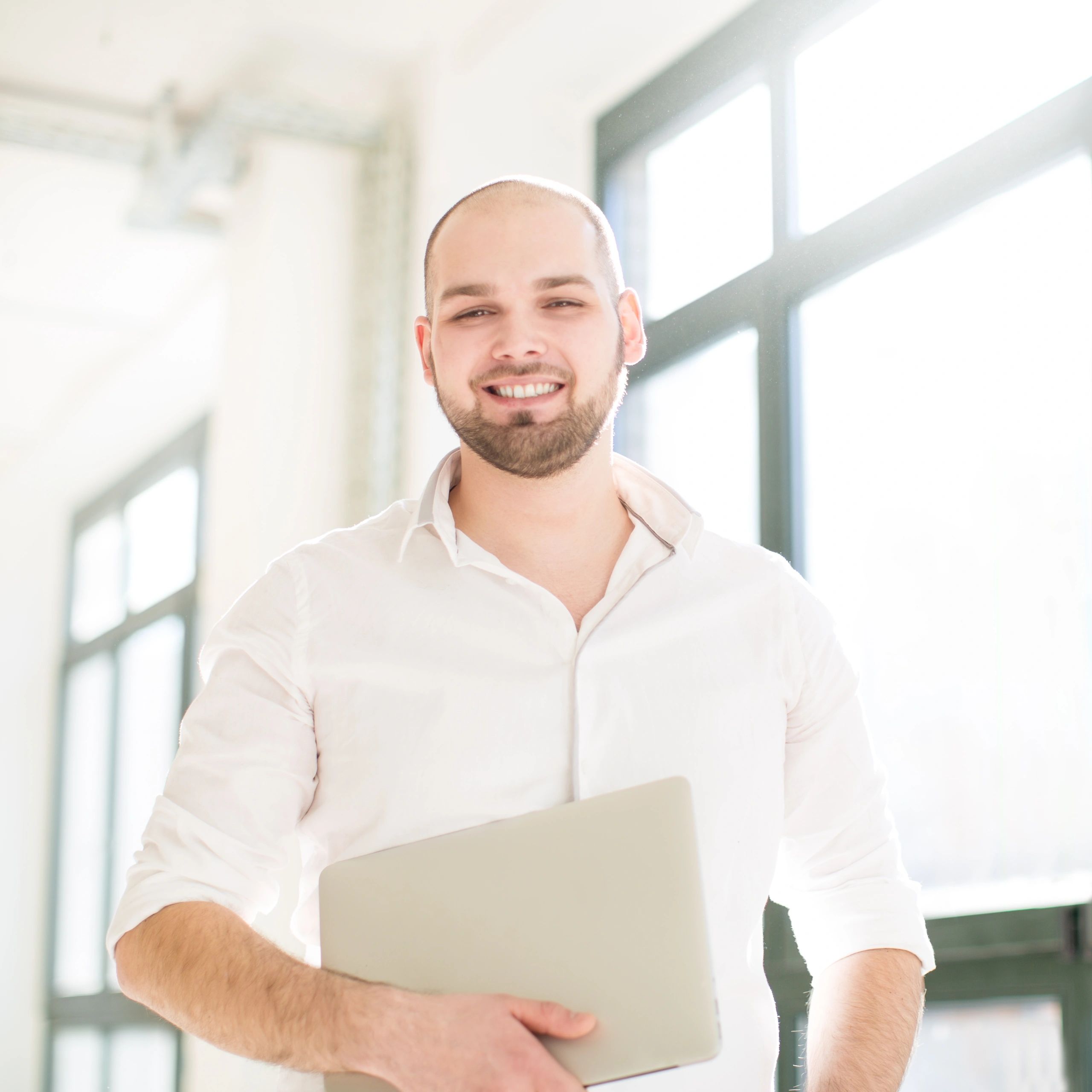 Portrait of a young man at a startup